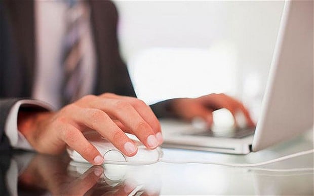 Office Worker Using a Laptop