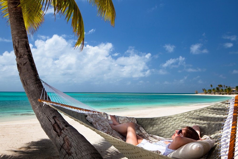 Woman Laying in a Hammock on Vacation