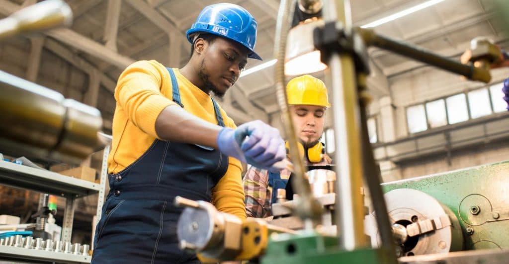 Two Industrial Workers On The Job