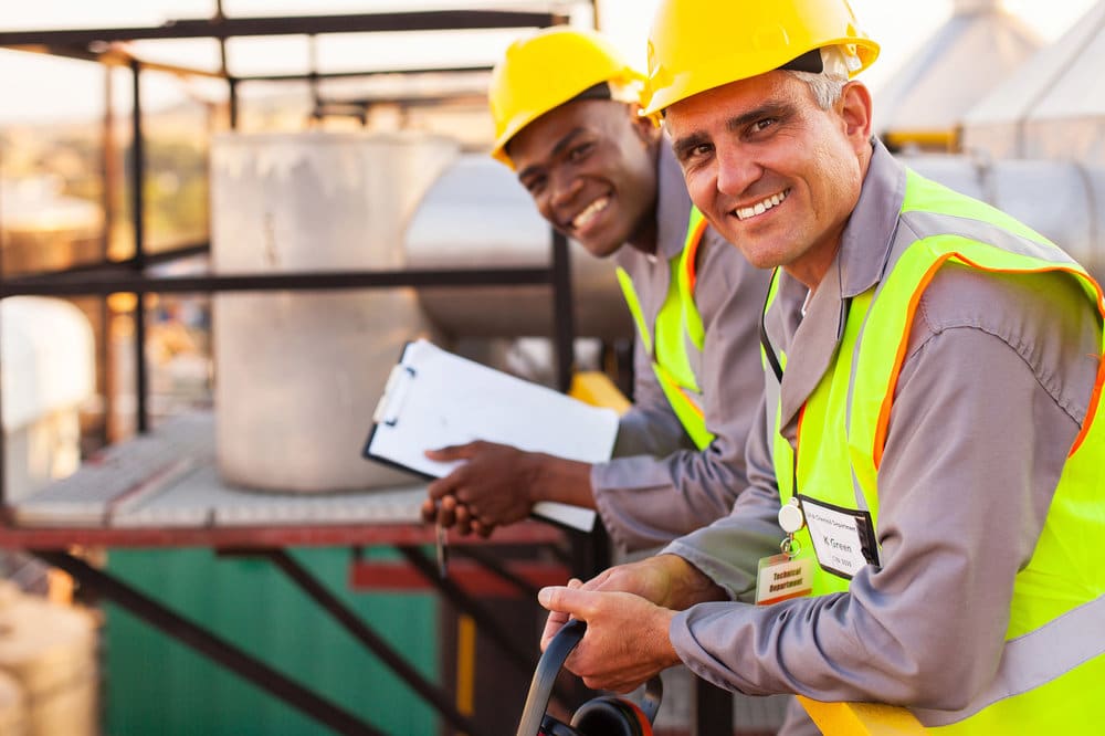 Technicians Smiling While On The Job