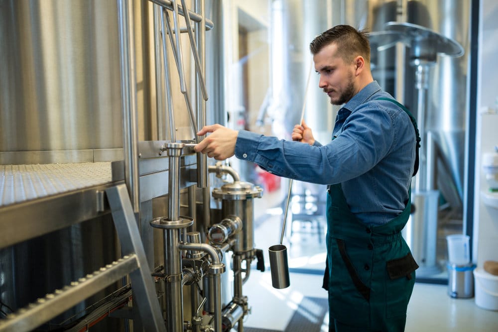 Industrial Worker Operating Machinery