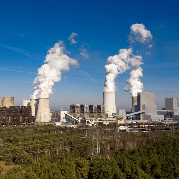 Nuclear Plant With Smoke Pillars