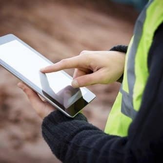 Construction Worker Using Digital Tablet