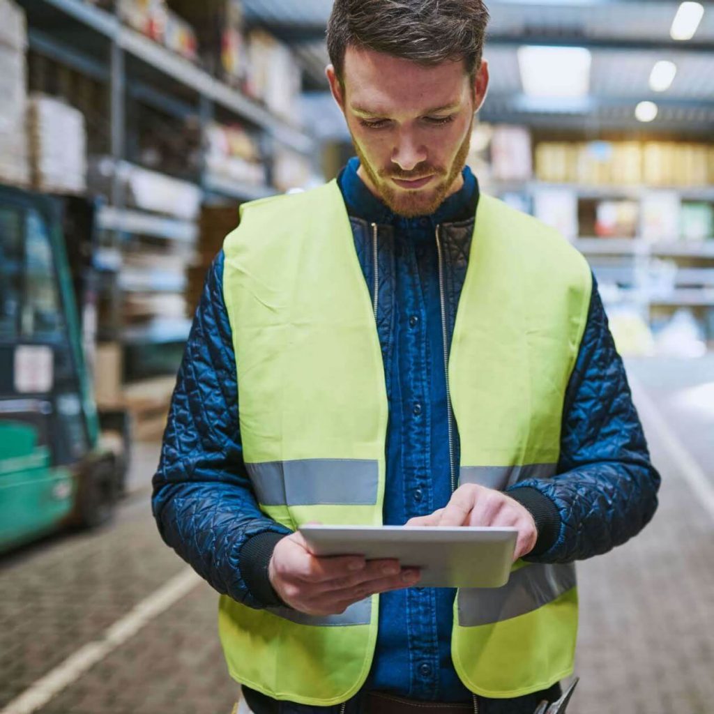 Male Factory Worker Using a Tablet