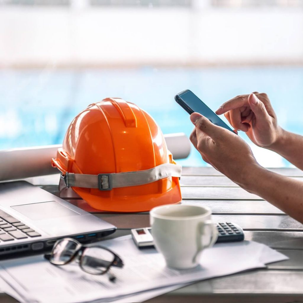 Construction Worker Using a Mobile Device