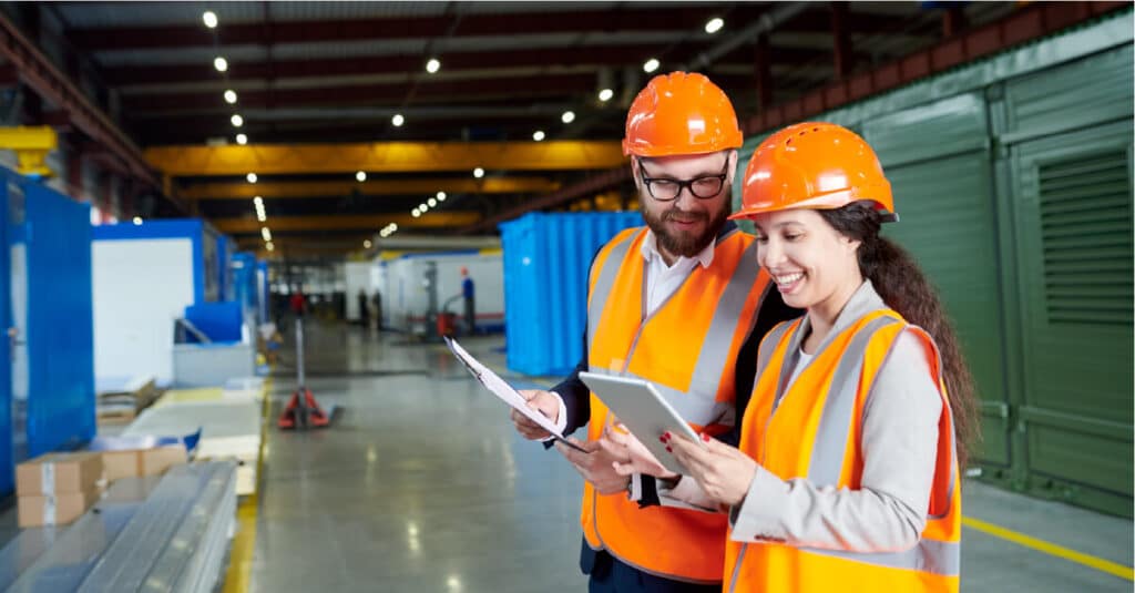 Two Workers Chatting Ipad