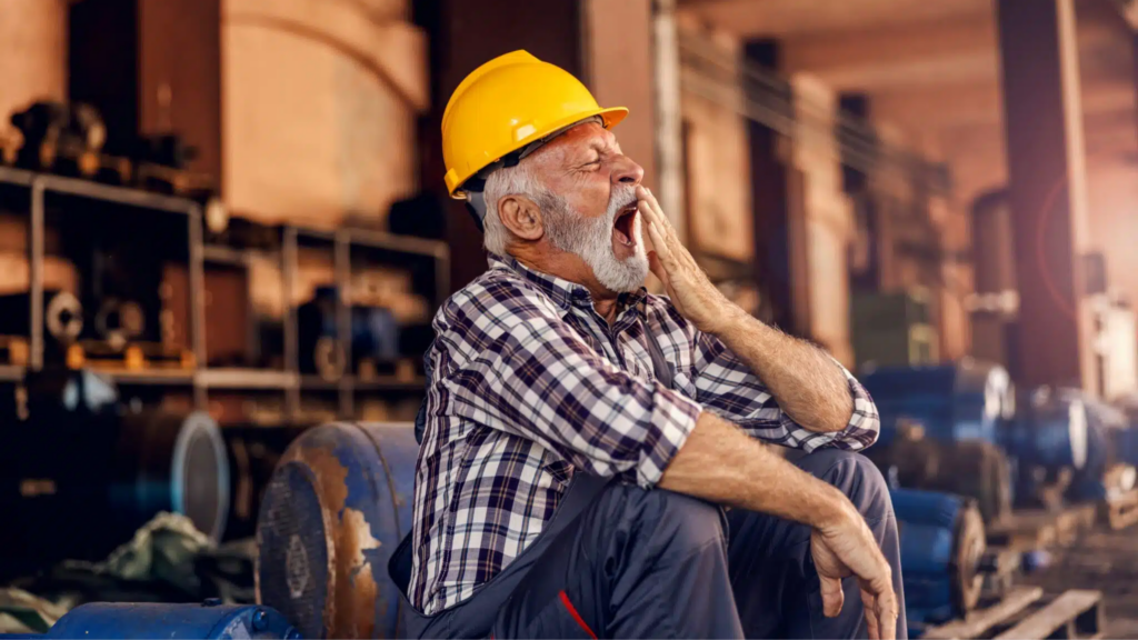 A,tired,senior,worker,is,sitting,next,to,the,machines,shift Work, Sleep Disturbance, Depression