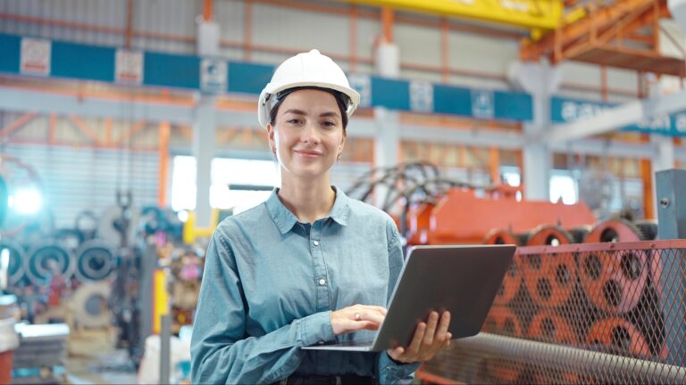 Close,up,smiling,face,of,engineer,manager,leader,woman,wearing,workforce strategy