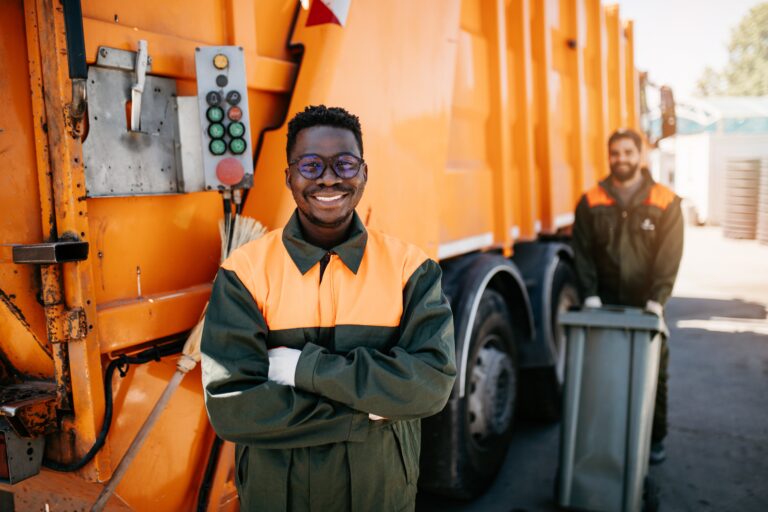 Caucasian,and,black,young,garbage,men,working,together,on,emptying,Labor Solutions