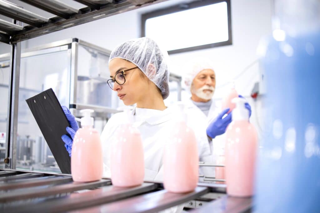 Factory,workers,or,technologists,controlling,process,of,shampoo,production,chemical manufacturers.