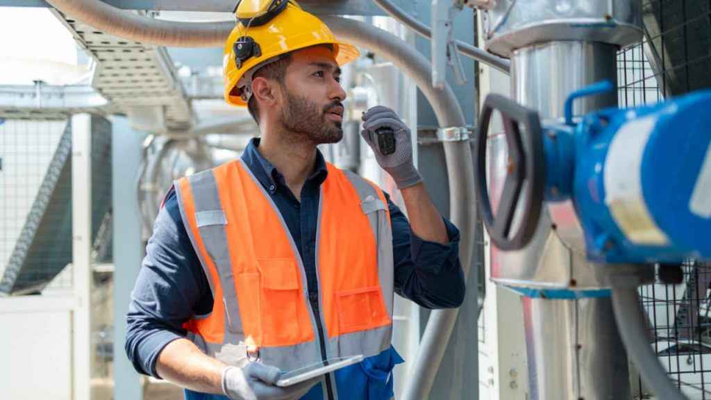 An,engineer,checks,the,status,of,a,large,ahu,air, Contractor Scheduling Software