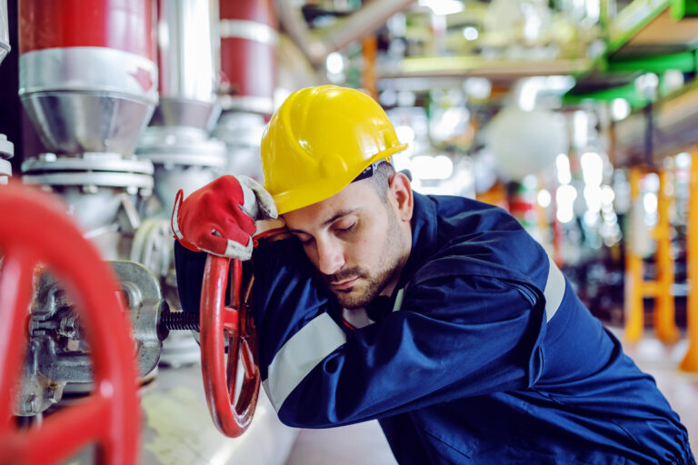 Hardworking,caucasian,worker,in,working,clothes,leaning,on,big,valve,Fatigue Risk Management System