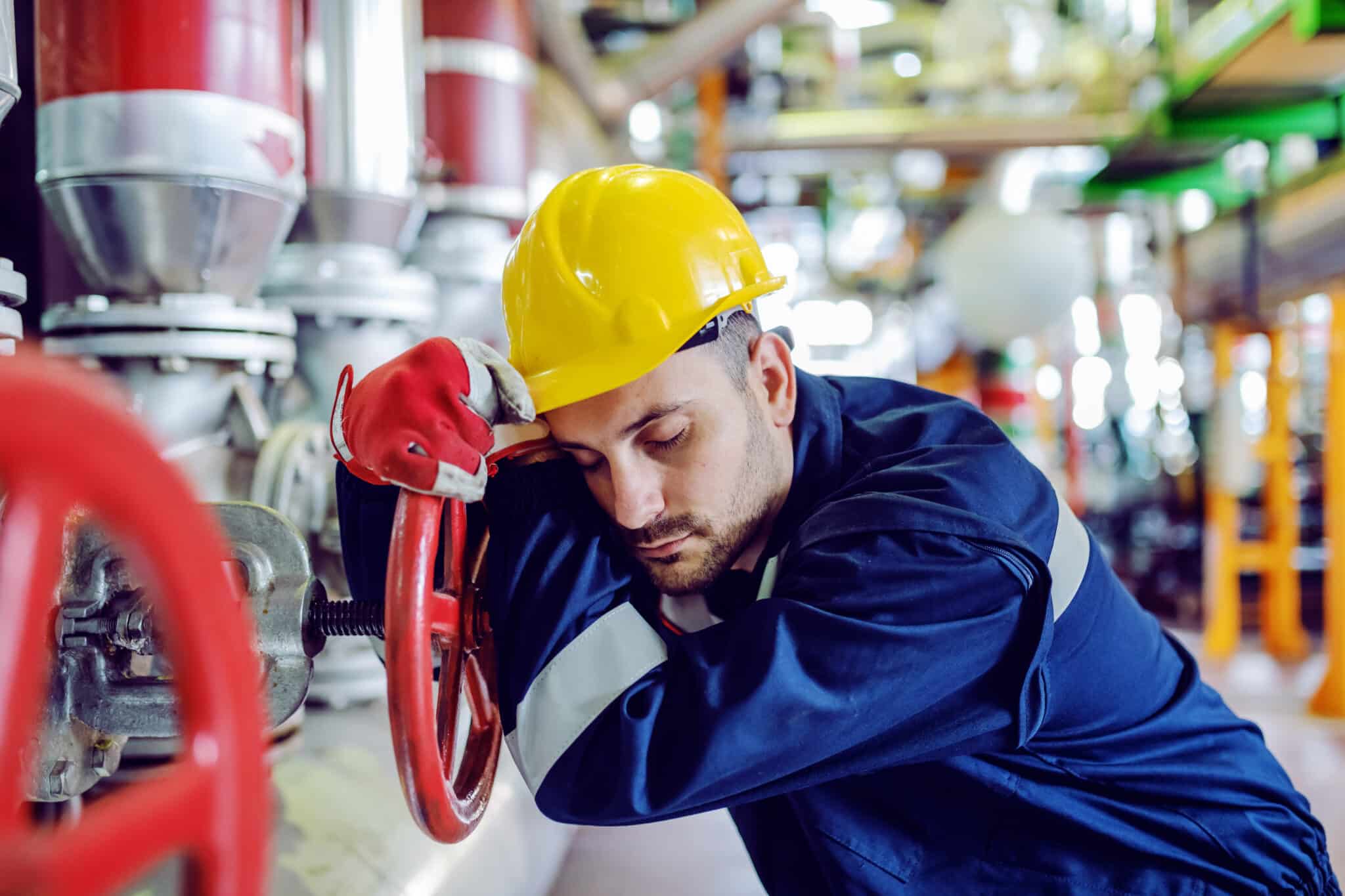 Hardworking,caucasian,worker,in,working,clothes,leaning,on,big,valve,Fatigue Risk Management System