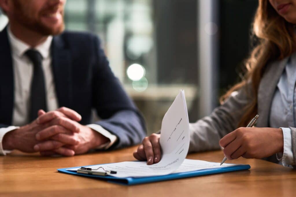 Documents,,contract,and,business,people,writing,signature,for,deal,,partnership, Compliance Management System