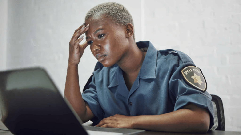 Police,,woman,and,headache,from,working,with,stress,on,computer, Police Officer Schedule