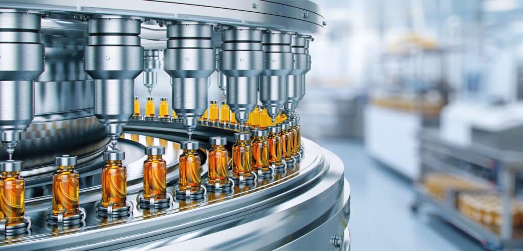 Drug,manufacturing,process.,conveyor,with,medical,ampoules,line,at,a,Discrete vs Process Manufacturing