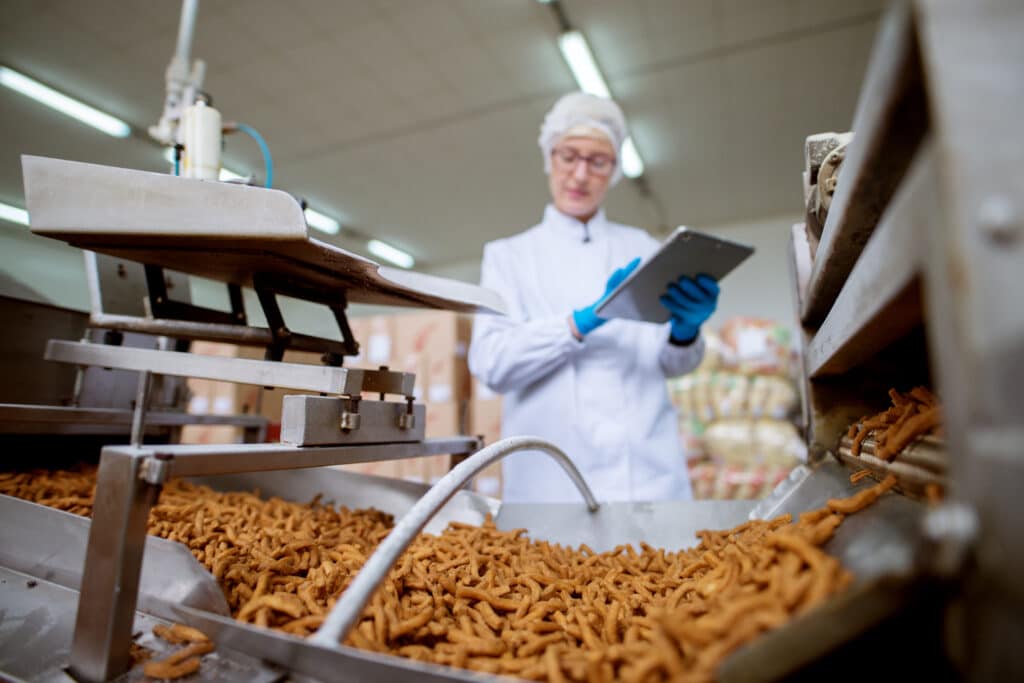 Woman Checking Pretzel Private Label Manufacturing