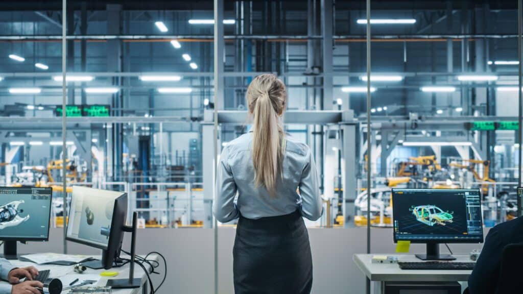 Car,factory,office:,successful,female,chief,engineer,overlooking,factory,production, auto trends, Joe McCabe, Autoforecast Solutions