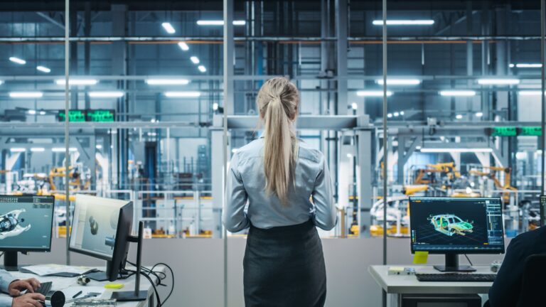 Car,factory,office:,successful,female,chief,engineer,overlooking,factory,production, auto trends, Joe McCabe, Autoforecast Solutions