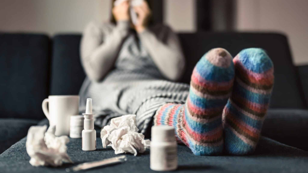 Call Out Sick Adult On Couch With Tissues