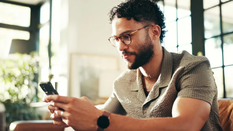 Home,,scroll,and,man,on,sofa,,smartphone,and,message,to, how to call off work