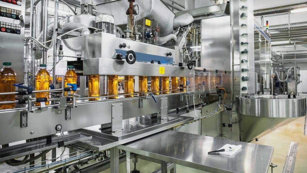 A stock photo of an empty station in a warehouse or manufacturing setting.